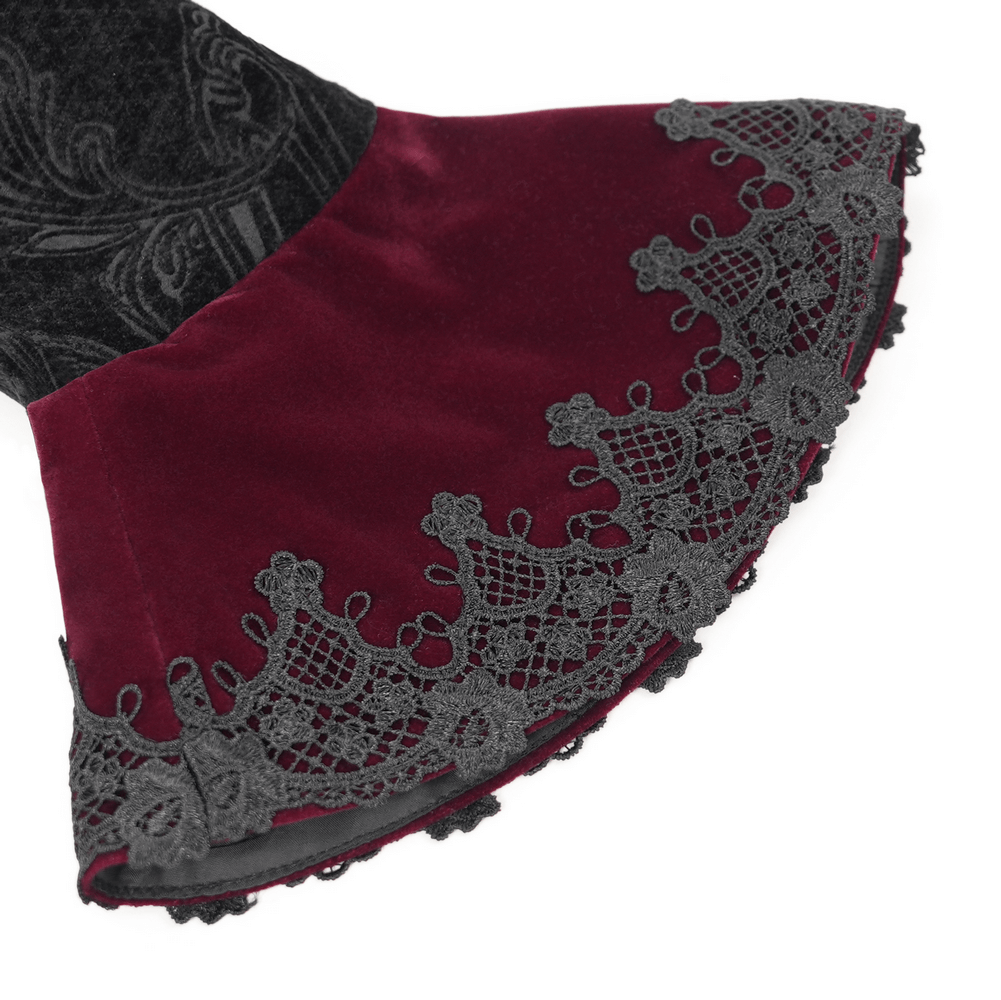 Close-up of burgundy bell sleeve with intricate black lace trim from a gothic Victorian jacket.