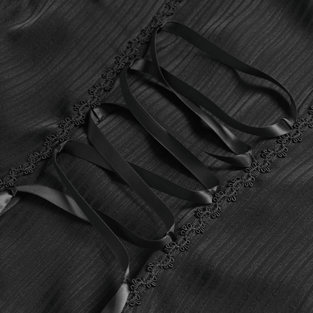 Close-up of Gothic Victorian Lace Blouse with Corset Back featuring intricate ribbon tie detail and ornate lace trim.