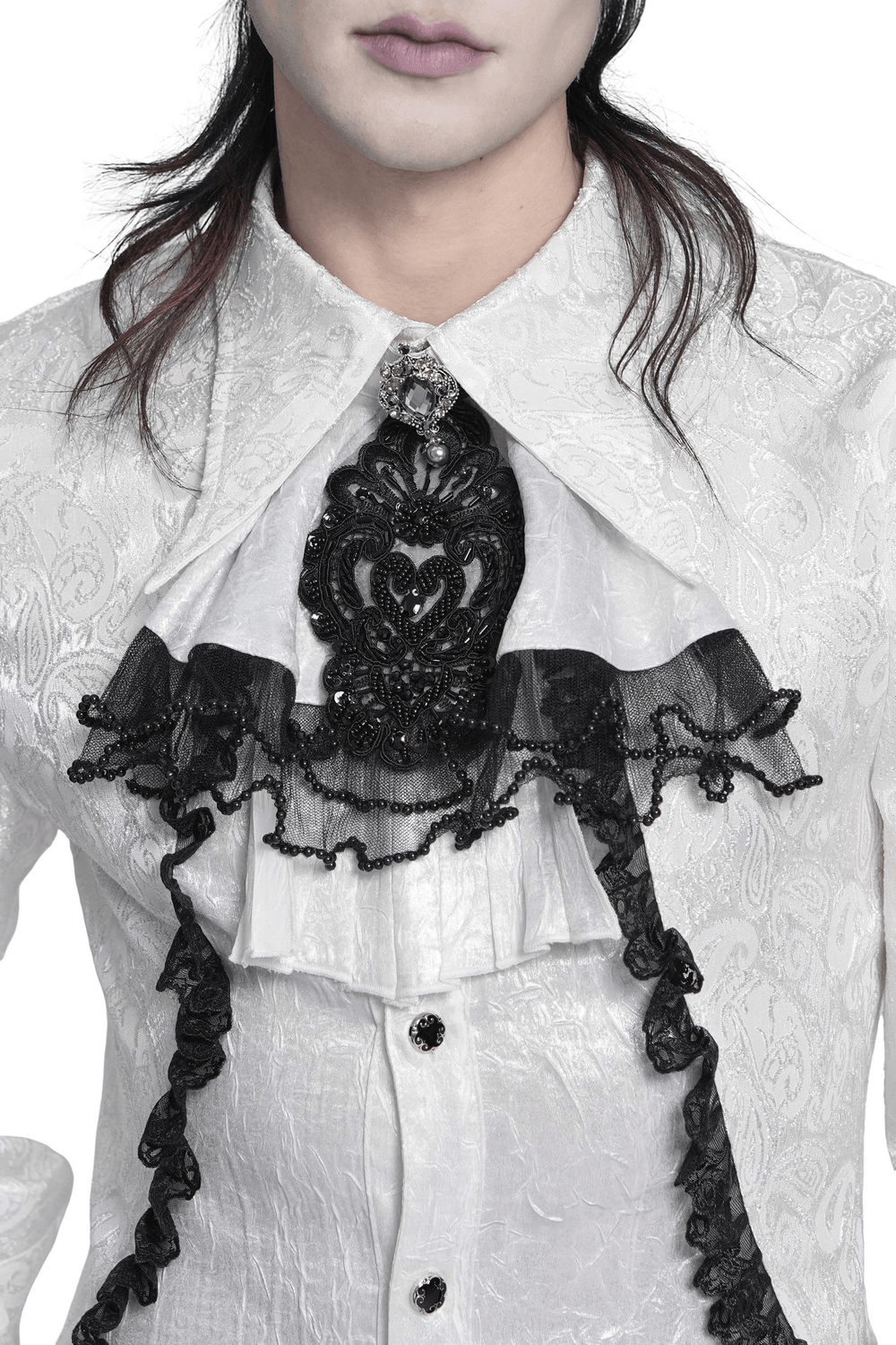 Gothic Victorian Lace Jabot Collar With Brooch elegantly displayed on a white shirt, featuring intricate black lace and brooch detail.
