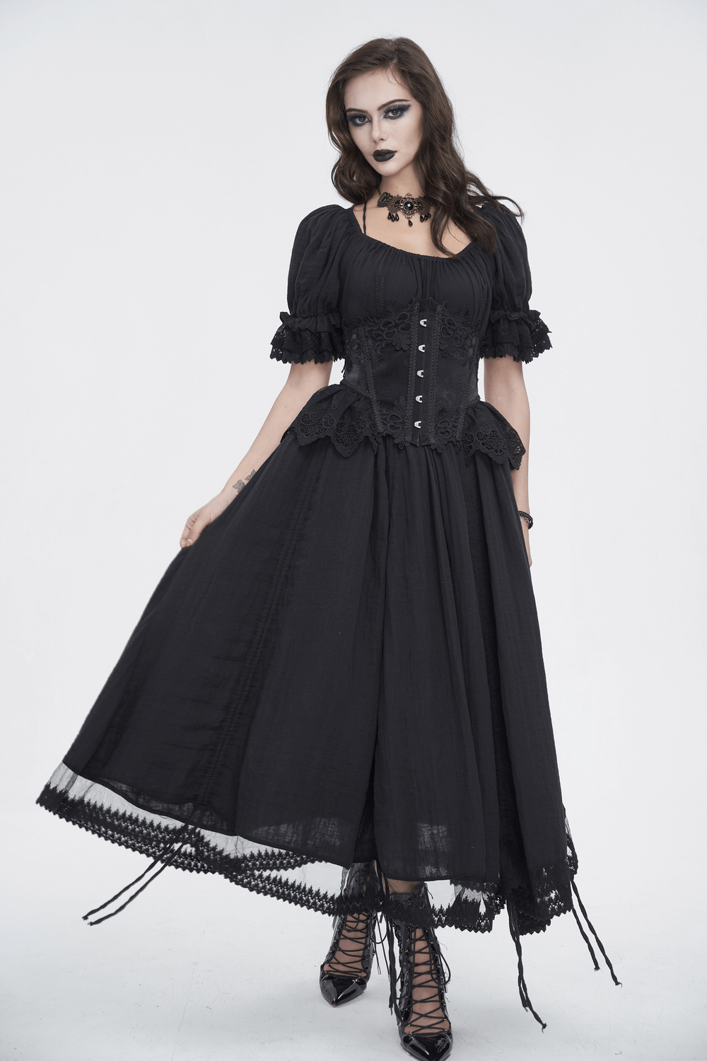Gothic Victorian lace-up dress with puff sleeves, perfect for the dark romance aesthetic.