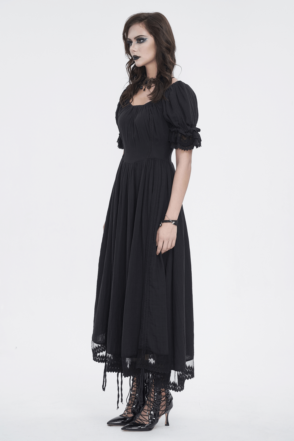Gothic Victorian lace-up dress with puff sleeves, perfect for dark romance and gothic fashion vibes.