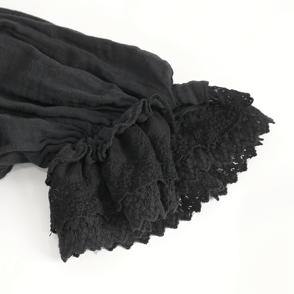 Close-up of dark black lace trim on a flowing fabric, perfect for a gothic Victorian style outfit.