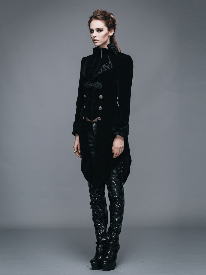 Gothic vintage women's black trench coat with steampunk embroidery, fitted cut highlighting figure.