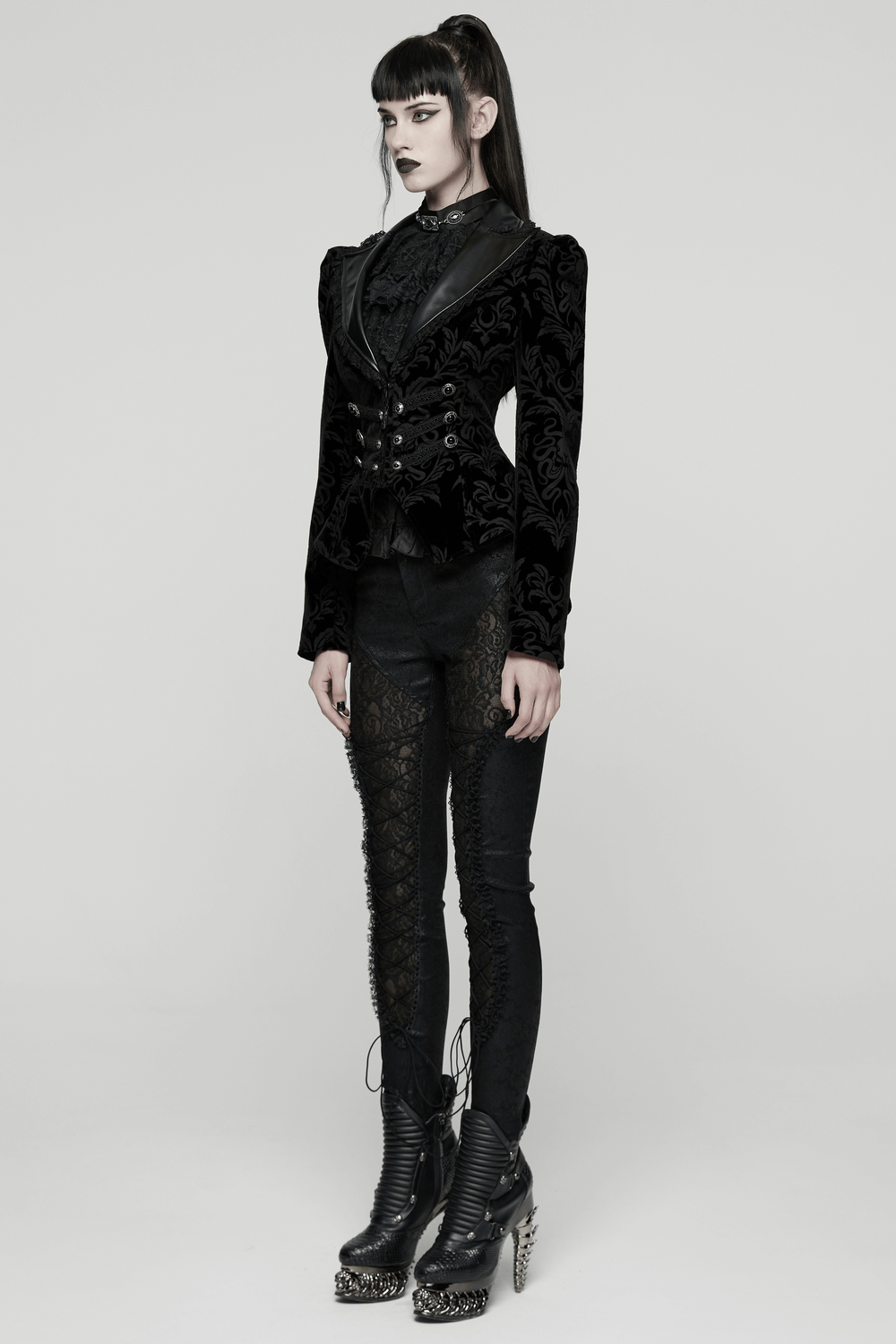 Gothic Vintage Lace-Up Velvet Jacket with Gemstone Buttons on a model showcasing a striking gothic style outfit.
