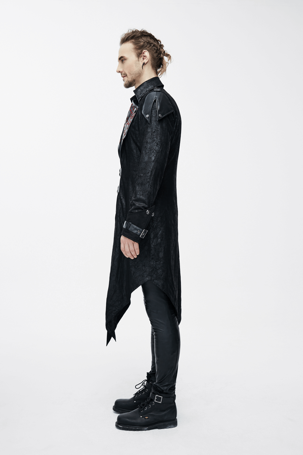 Side view of a man wearing a gothic vintage long black coat, showcasing its stylish design and comfortable fit.
