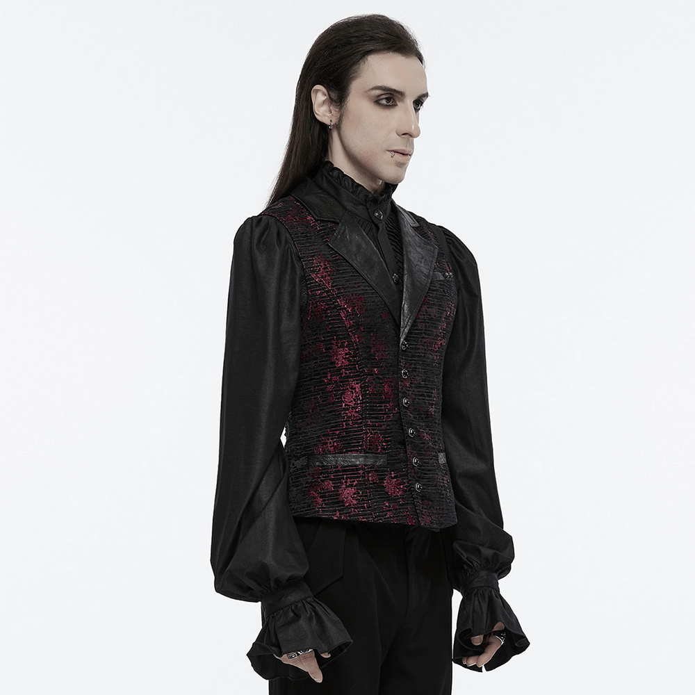 Gothic waistcoat with skull accents and gemstone buckle, styled in a dramatic black and red ensemble.