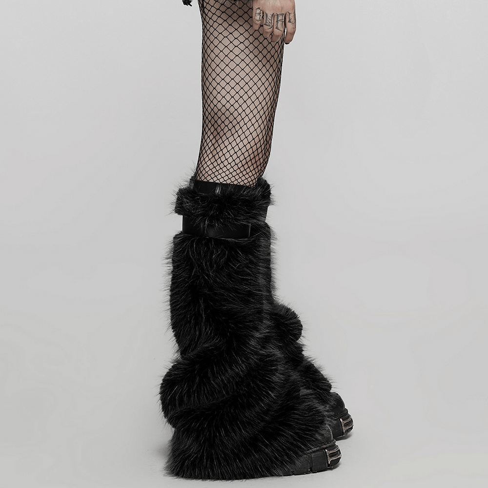 Gothic warm leg warmers in black faux fur, featuring detachable loops and paired with fishnet stockings.
