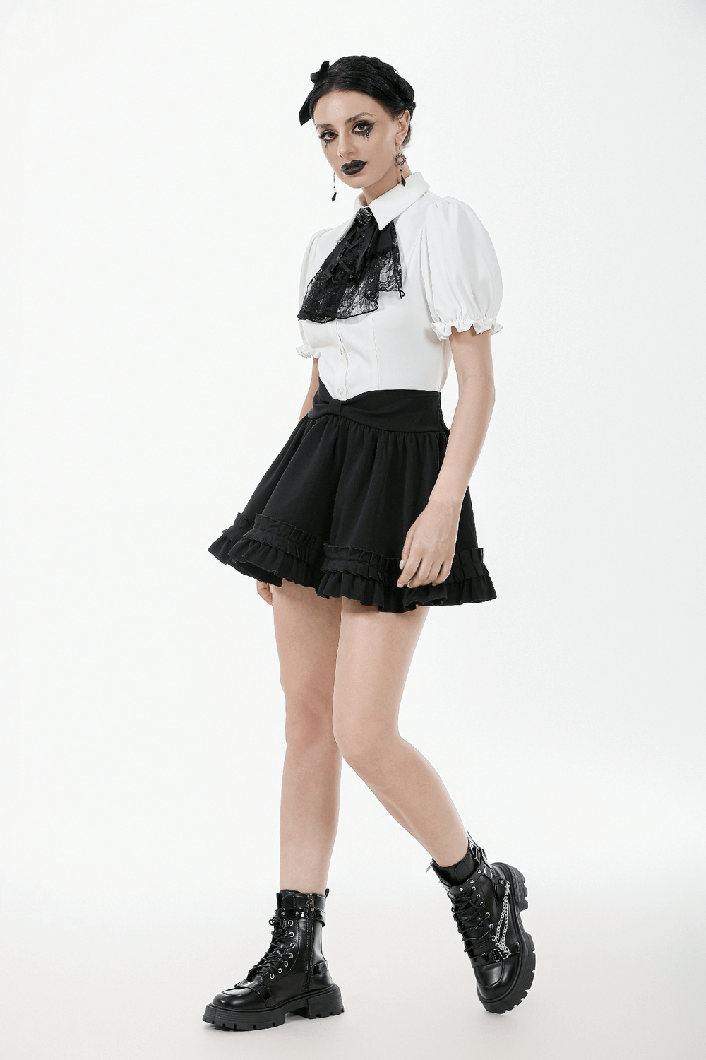 Gothic white blouse with detachable lace jabot, paired with a black skirt and boots for alternative fashion lovers.