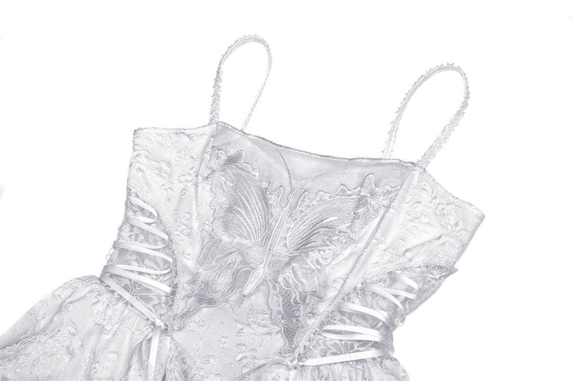 Gothic white butterfly dress with corset bodice and delicate embroidery, perfect for a dark angel bride.