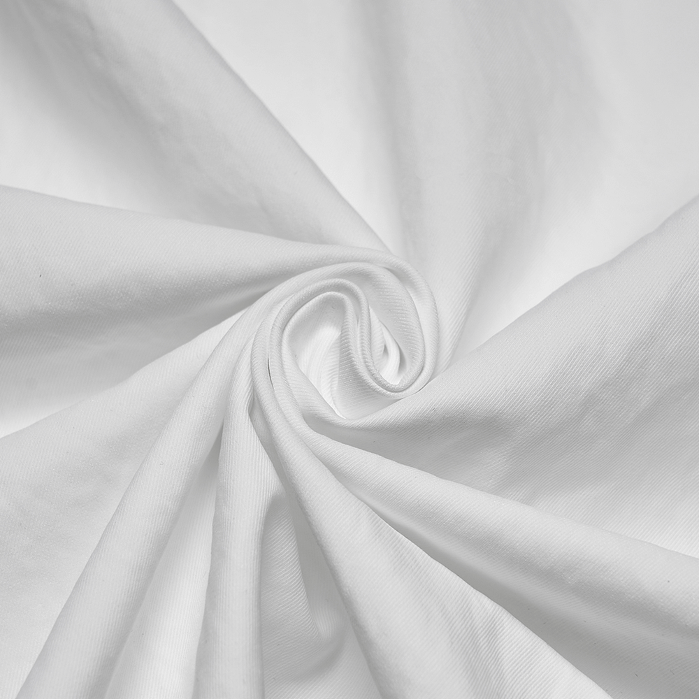 Gothic White Ruffled Long Sleeve Shirt with Lace Details fabric close-up showcasing eco-friendly cotton texture.