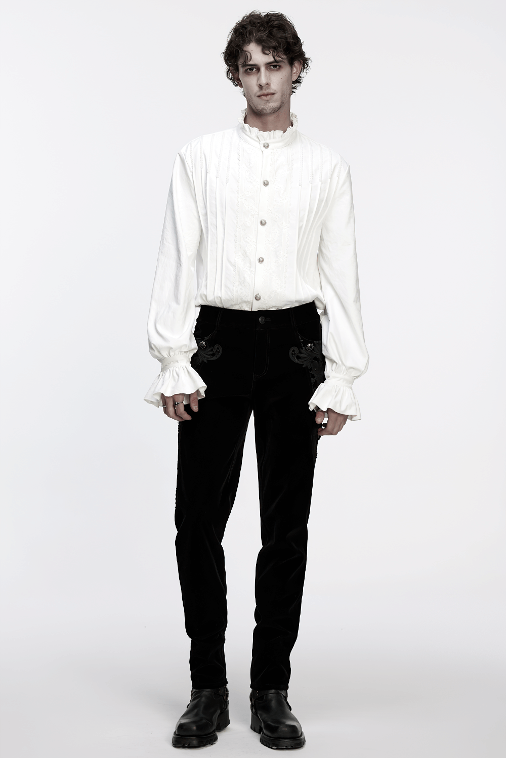 Gothic White Ruffled Long Sleeve Shirt with Lace Details worn with stylish black pants, showcasing a chic gothic fashion statement.