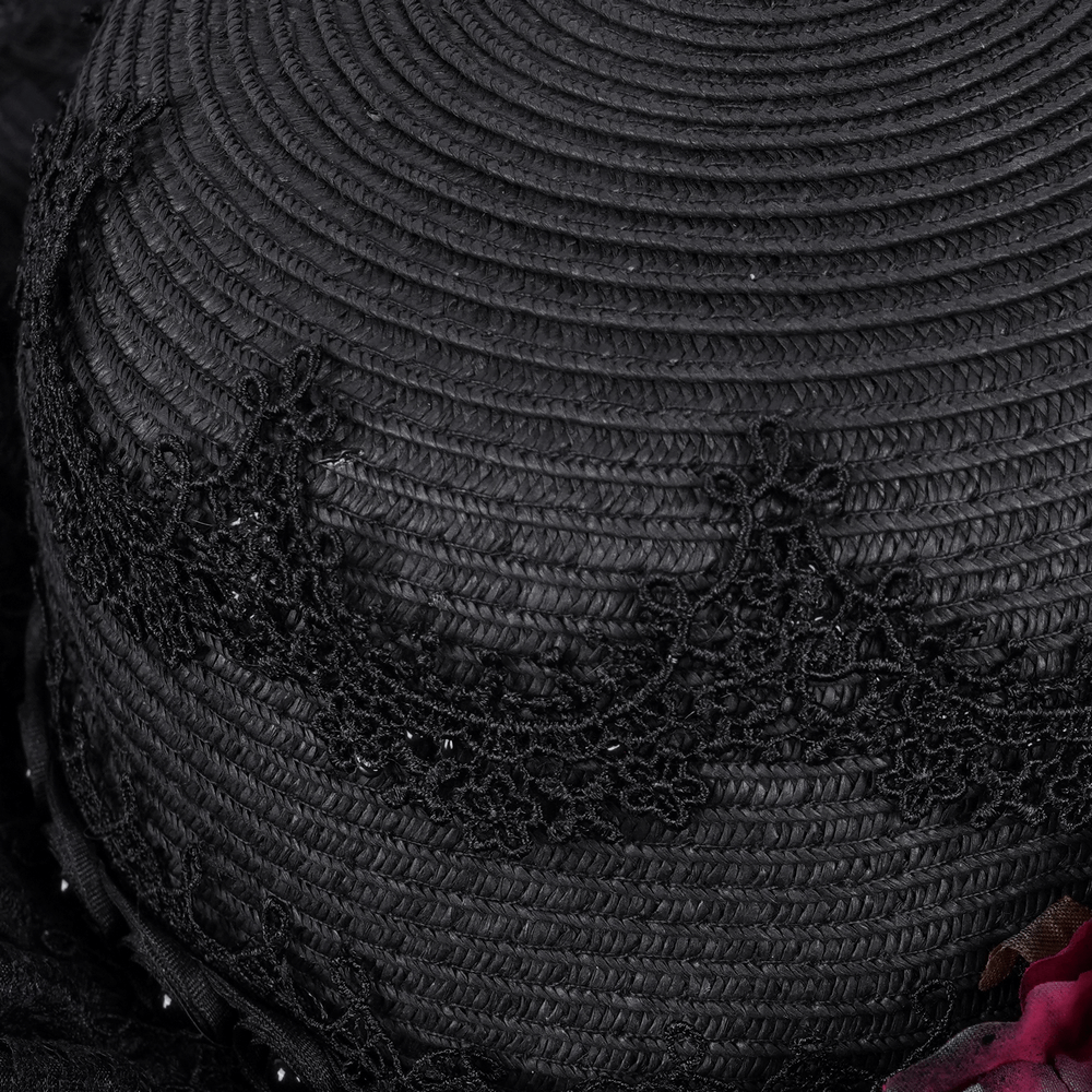 Gothic wide-brim hat featuring intricate black lace and red floral accents for vintage elegance.