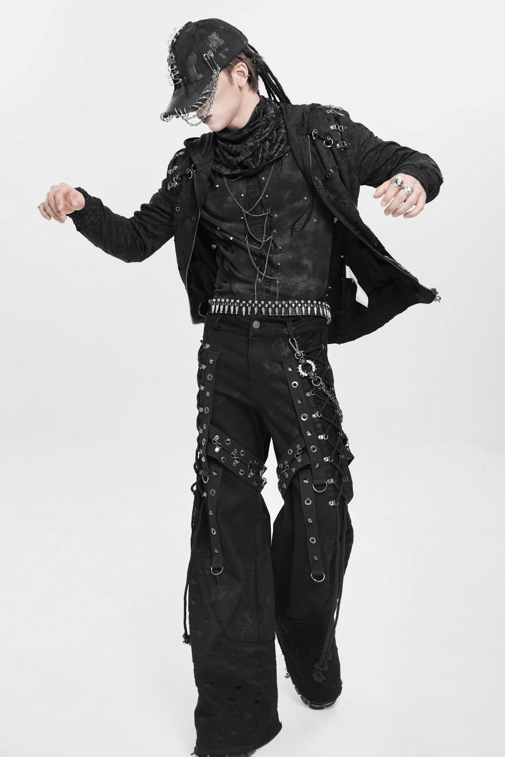 Gothic Wide Leg Pants with Buckles and Mesh Panels worn with a punk style jacket and accessories.