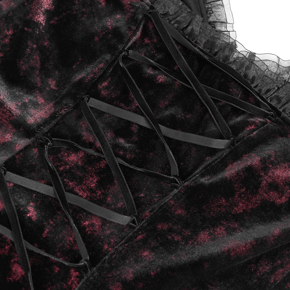 Close-up of the corset lace-up back design on a gothic wine red and black velvet dress.