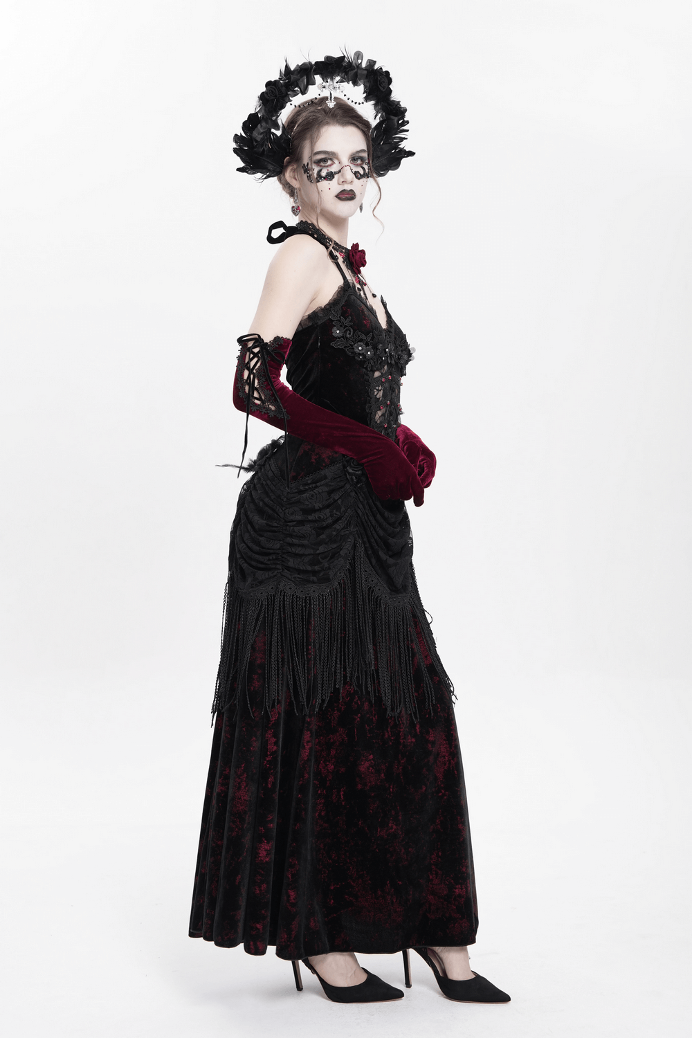 Gothic wine red and black velvet dress with lace, fringe, and corset, perfect for Victorian gatherings.