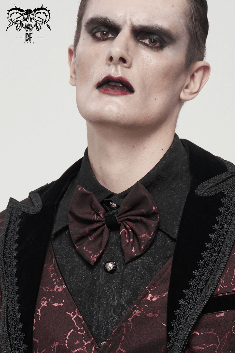 Gothic wine red jacquard bowtie on a man, showcasing elegant dark fashion and lace-up design.