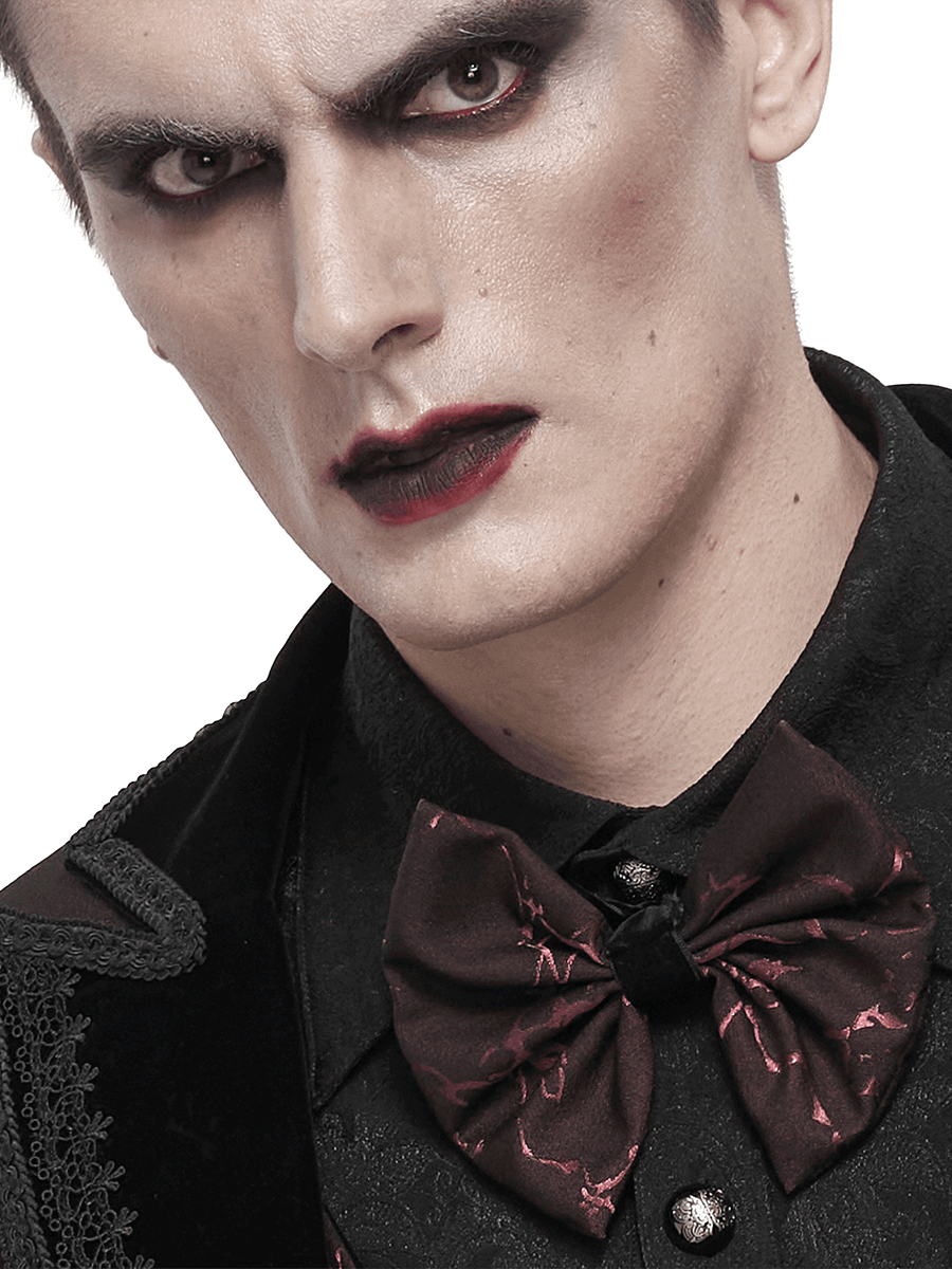 Close-up of a model wearing a gothic wine red jacquard bowtie, showcasing dark elegance and bold style.