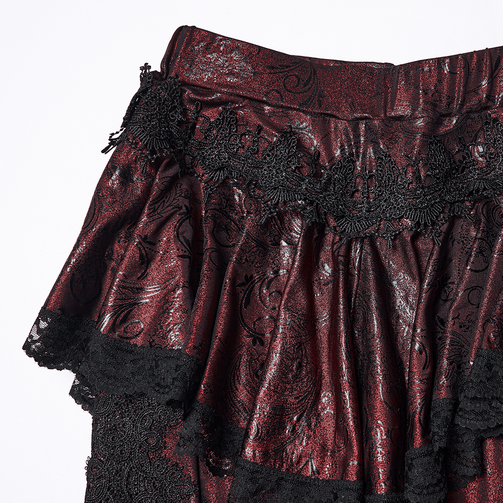 Gothic Wine Red Lace Flared Pants with Skirt Overlay featuring intricate lace trim and dramatic flared details.