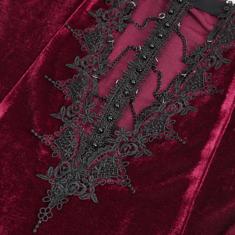 Close-up of gothic wine red dress with intricate black lace detail and seductive cutout, perfect for alternative fashion.