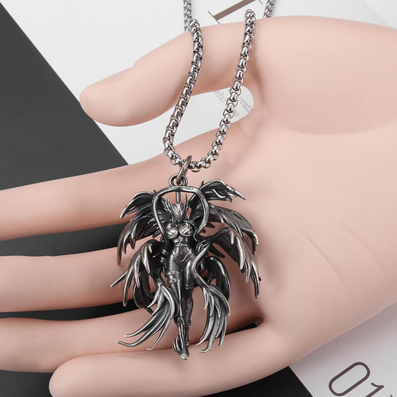 Gothic winged angel pendant necklace on hand, showcasing punk style in durable stainless steel.