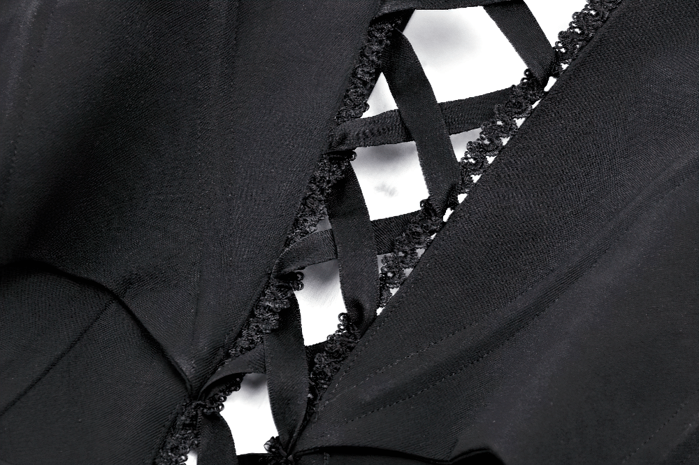 Close-up of intricate lace-up detailing on a gothic corset top, showcasing elegant black fabric and unique lace trim.