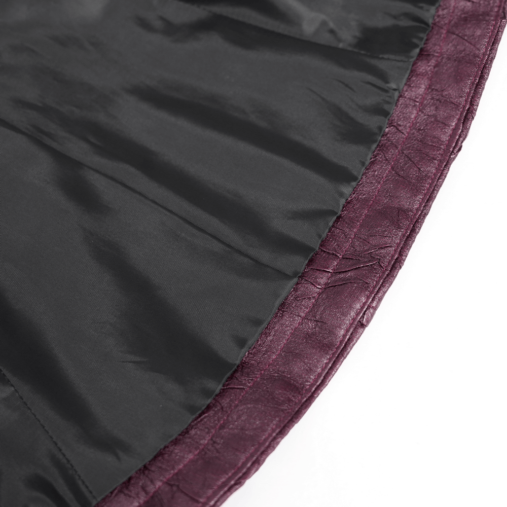 Interior view of gothic women's purple faux leather jacket showcasing rich fabric and intricate stitching details.