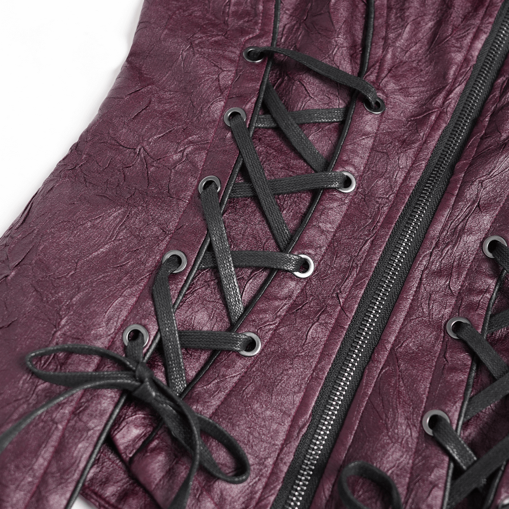 Close-up of lace-up detailing on Gothic women's purple faux leather jacket, showcasing edgy design elements.
