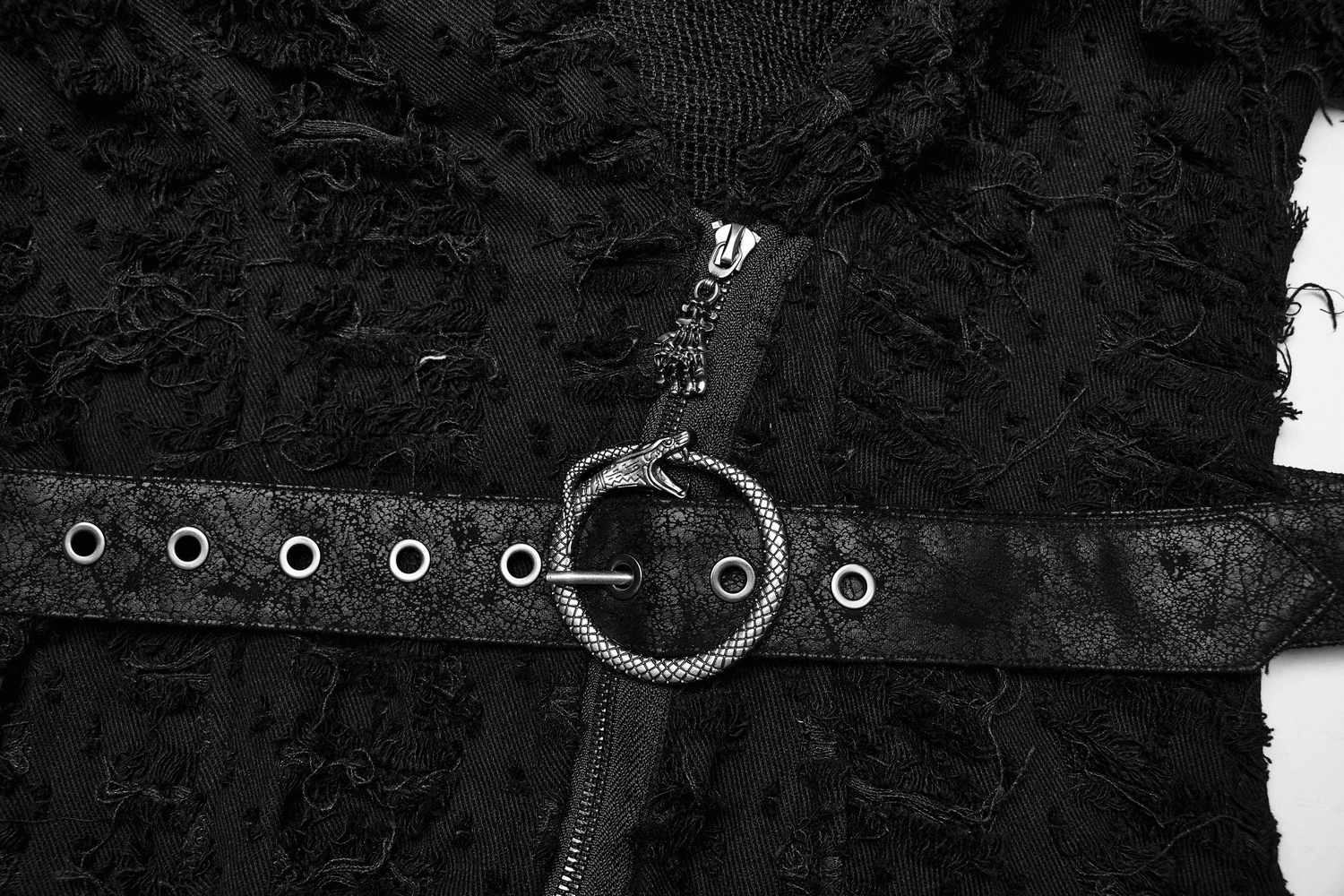 Close-up of a gothic black hooded cape featuring distressed fabric, a zip closure, and a snake motif belt.