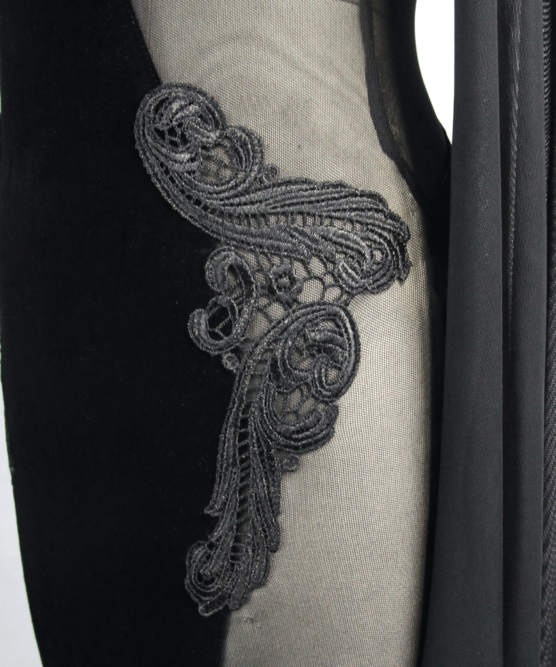 Close-up of intricate black lace detailing on a gothic dress's transparent side insert.