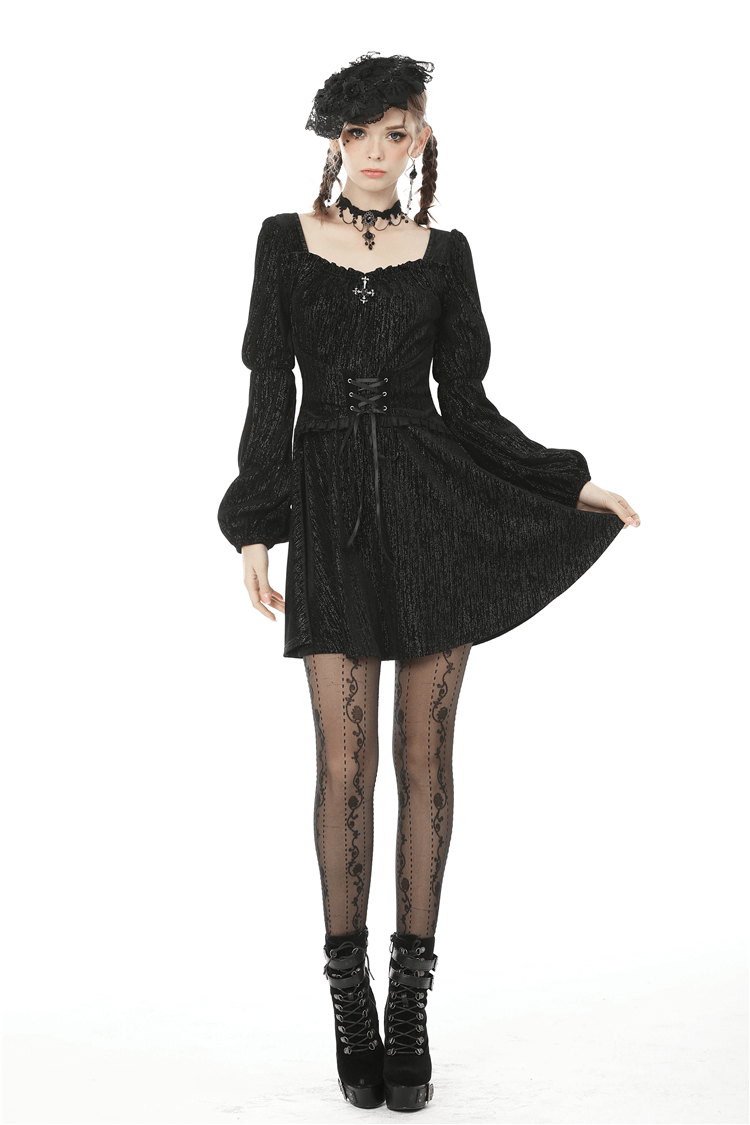 Gothic women's black mini dress with puffed sleeves and lace detailing, perfect for dark aesthetic fashion.