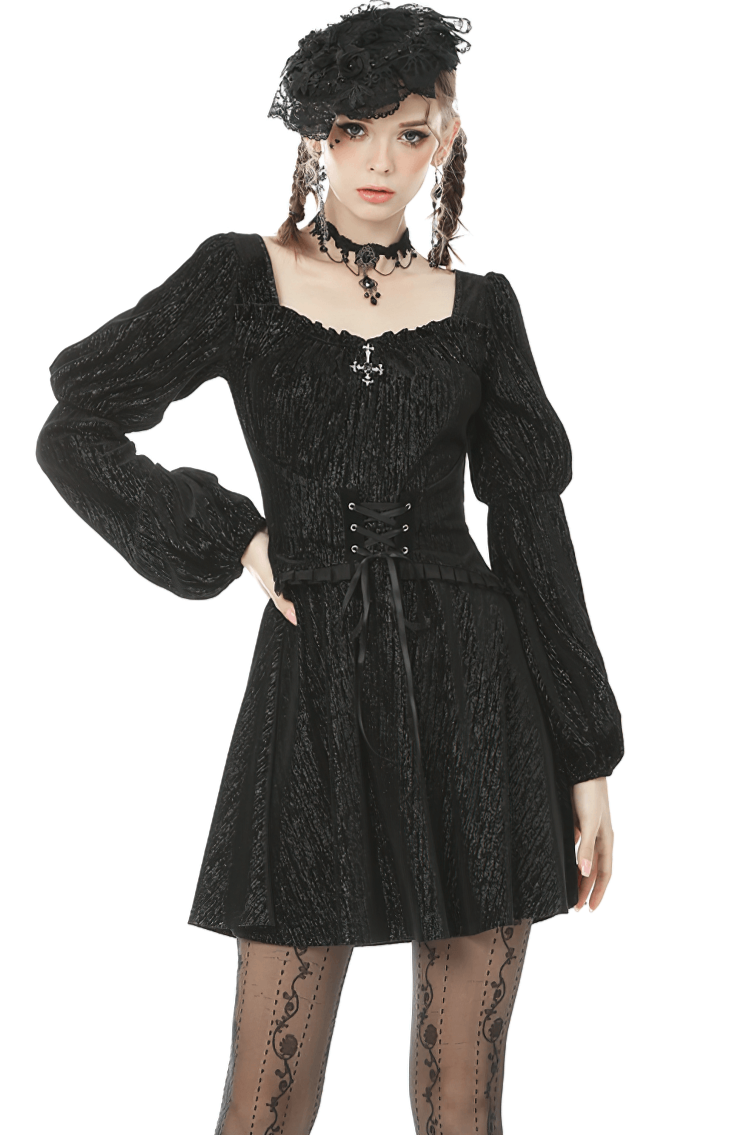 Elegant gothic women's black mini dress with puffed sleeves and lace detailing, perfect for dark aesthetic fashion.