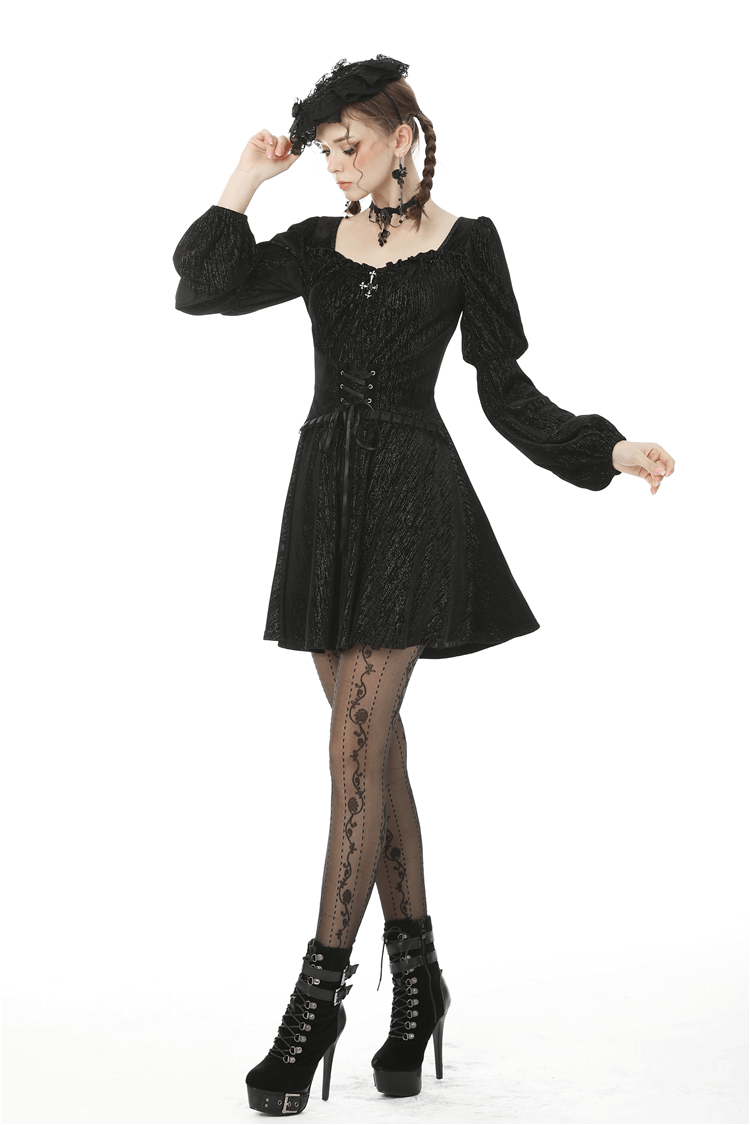 Gothic women's black mini dress with puffed sleeves and intricate lace details, perfect for dark aesthetic fashion.