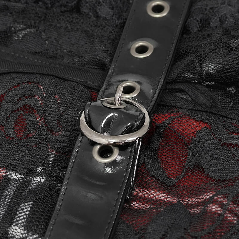 Close-up of gothic women's black and red plaid crop top featuring lace floral pattern and shiny buckle detail.