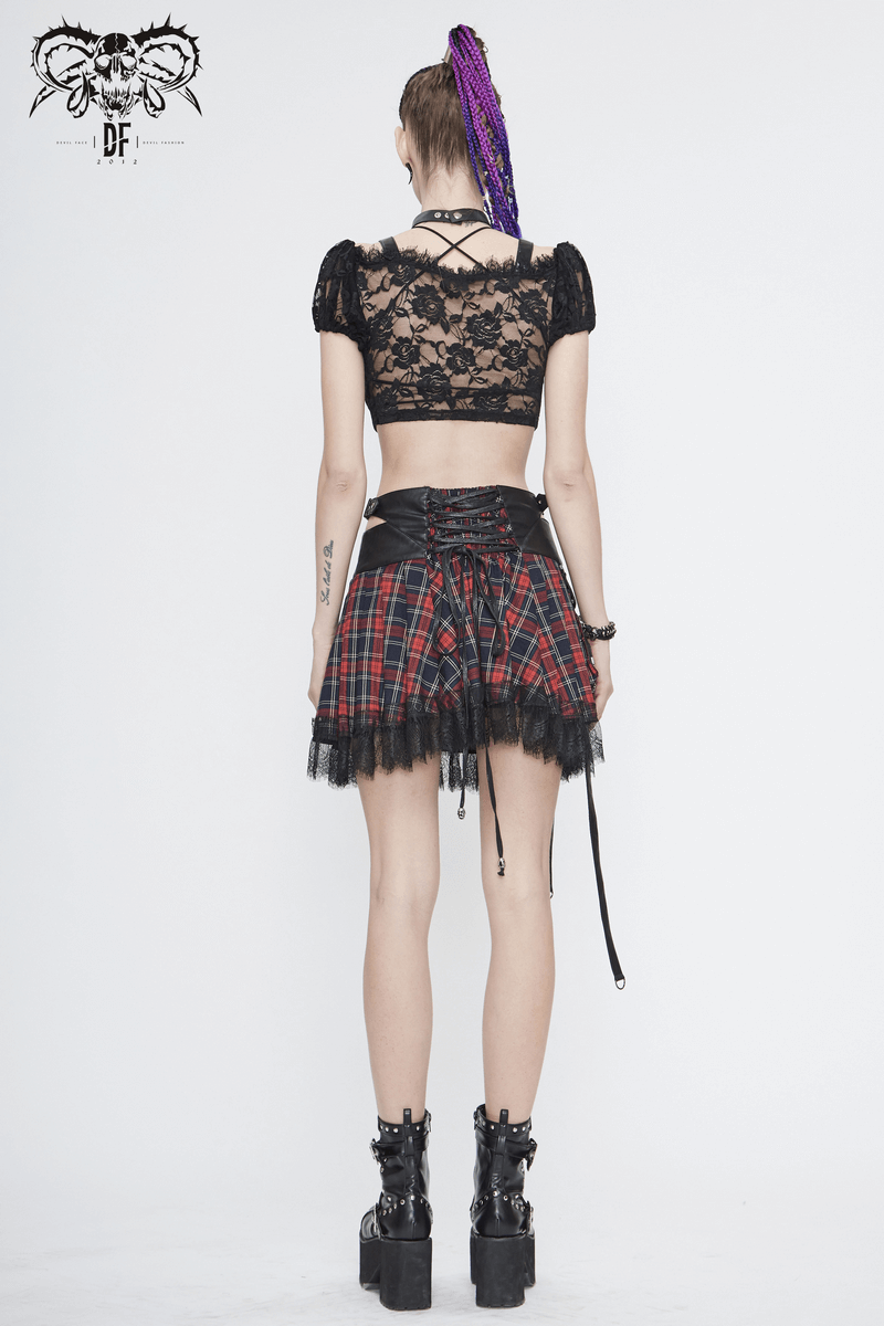 Gothic women's black lace crop top paired with a black and red plaid skirt, showcasing trendy street style.