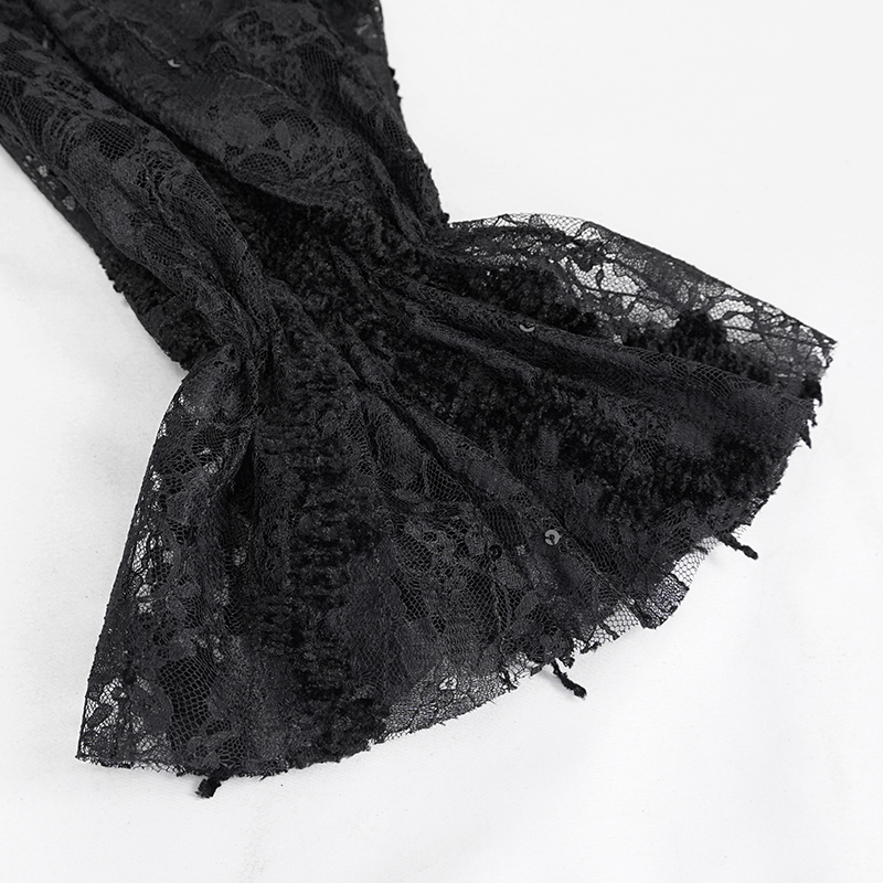 Close-up of elegant black lace and velvet sleeve detail on a gothic vintage women's top.