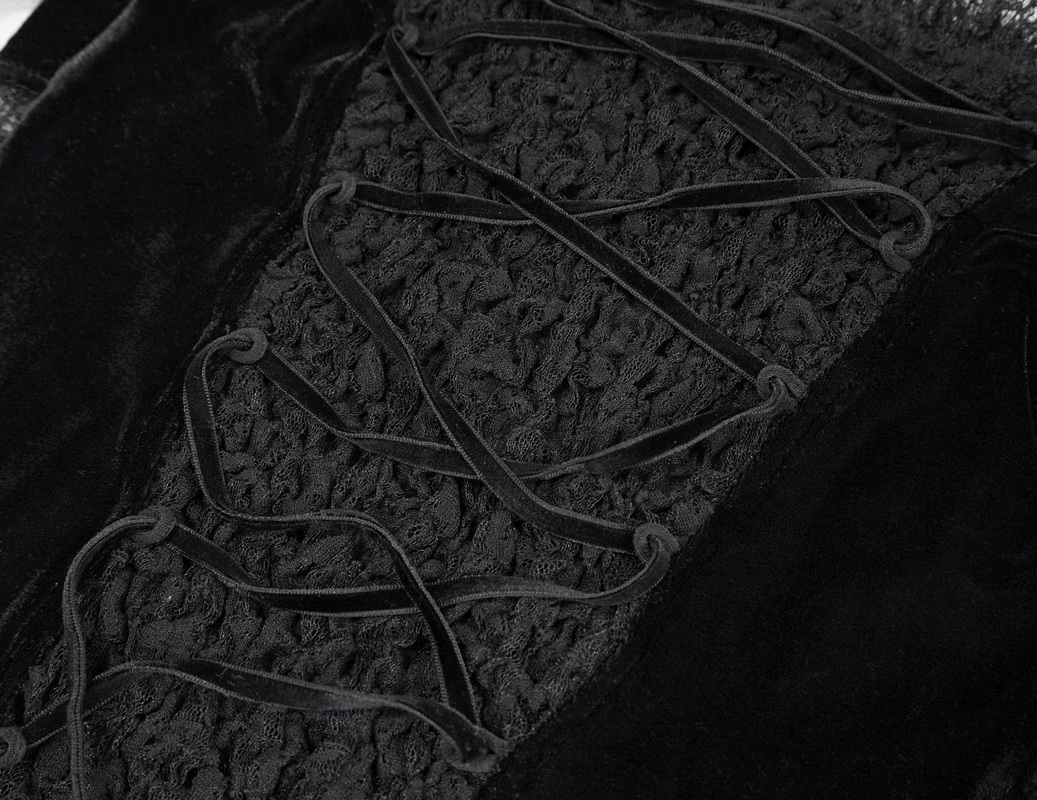 Close-up of elegant black velvet and lace detail on a Gothic women's top showcasing vintage design and ruched sleeves.