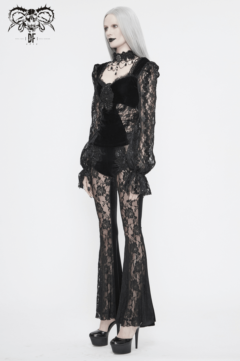 Gothic women's black velvet top with lace sleeves, paired with matching lace pants, showcasing a vintage-inspired elegant look.