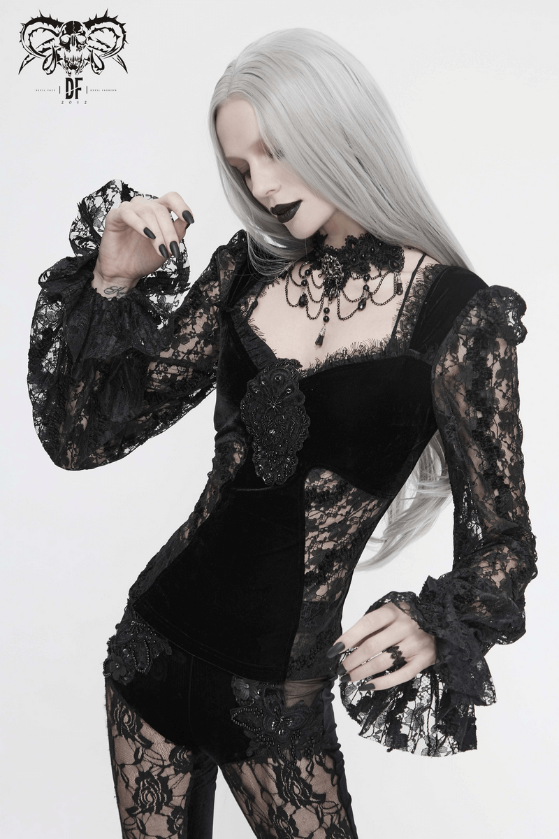 Gothic women's black velvet and lace top showcasing elegance with lace ruched sleeves and a vintage cut.