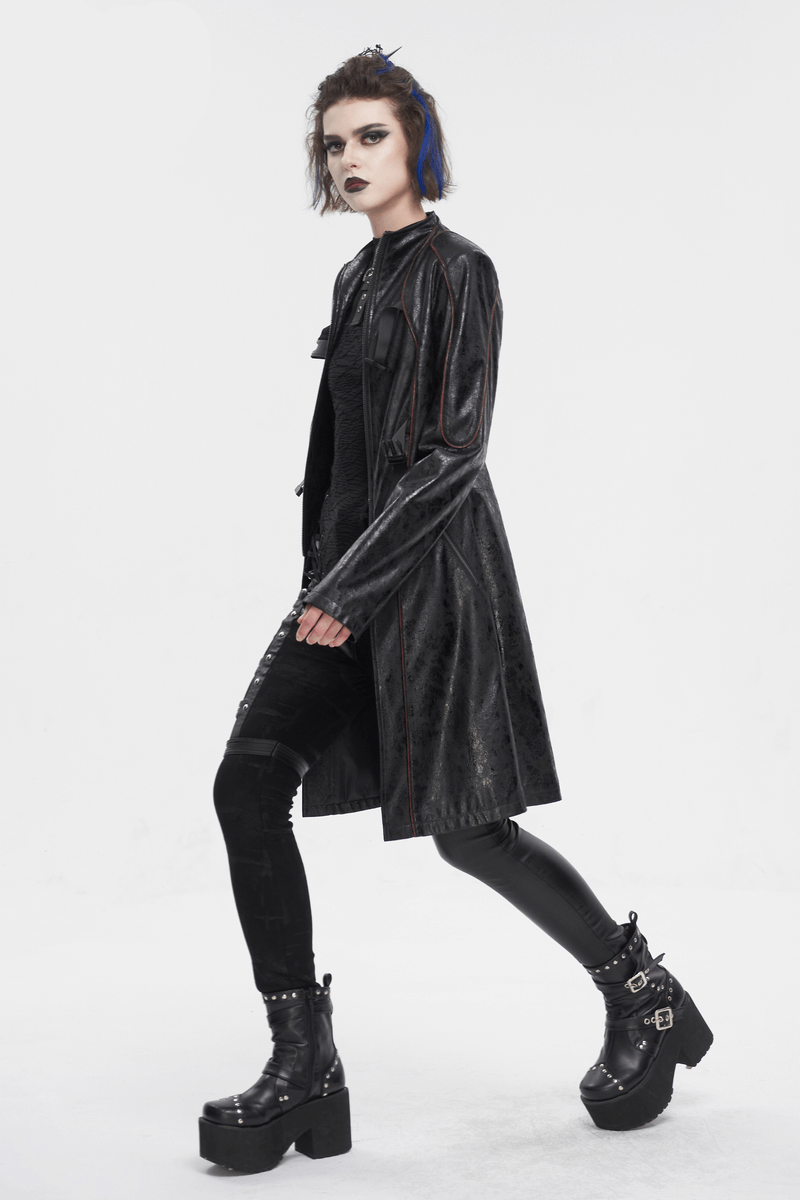 Gothic women's faux leather mid-length coat with buckle straps, paired with stylish platform boots, exuding edgy elegance.