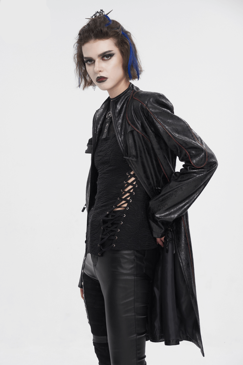 Edgy gothic woman in faux leather coat with buckle straps, showcasing striking style and bold sophistication.
