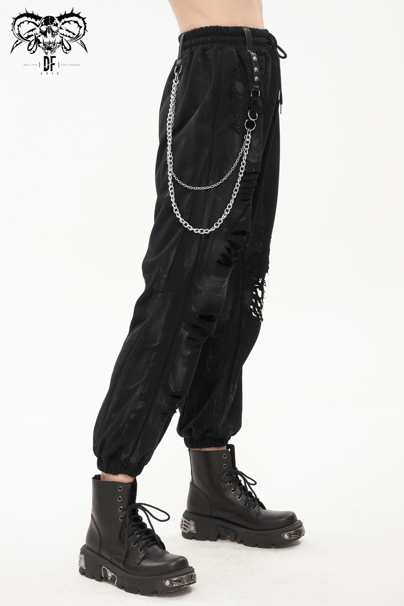 Gothic women's black cargo pants with chains and rivets in a trendy loose cut, perfect for stylish gothic fashion.