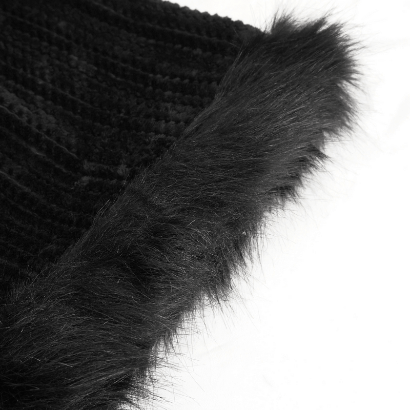 Close-up of fluffy black coat fabric showcasing soft texture and elegant fur trim.