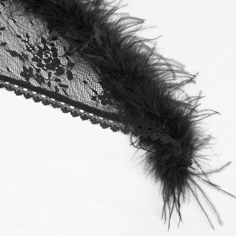 Close-up of gothic black floral lace with fluffy hem, showcasing intricate patterns and textures for a mystical vibe.