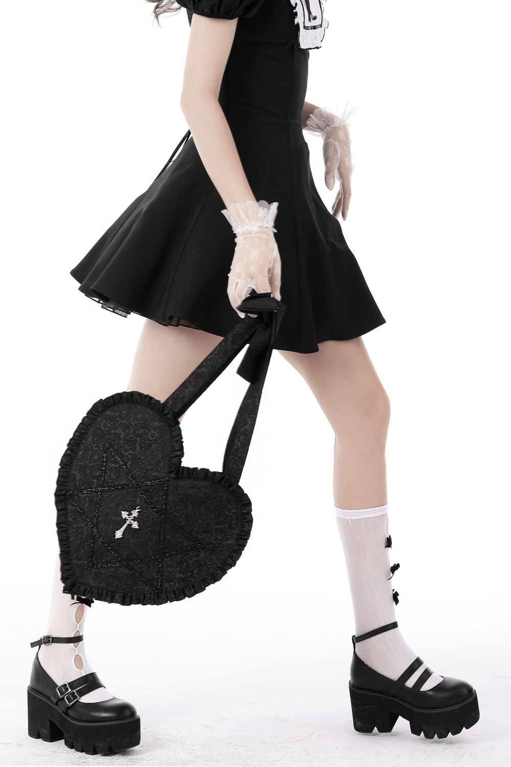 Gothic women's heart shoulder bag with cross detail, perfect for adding punk rock charm to any outfit.