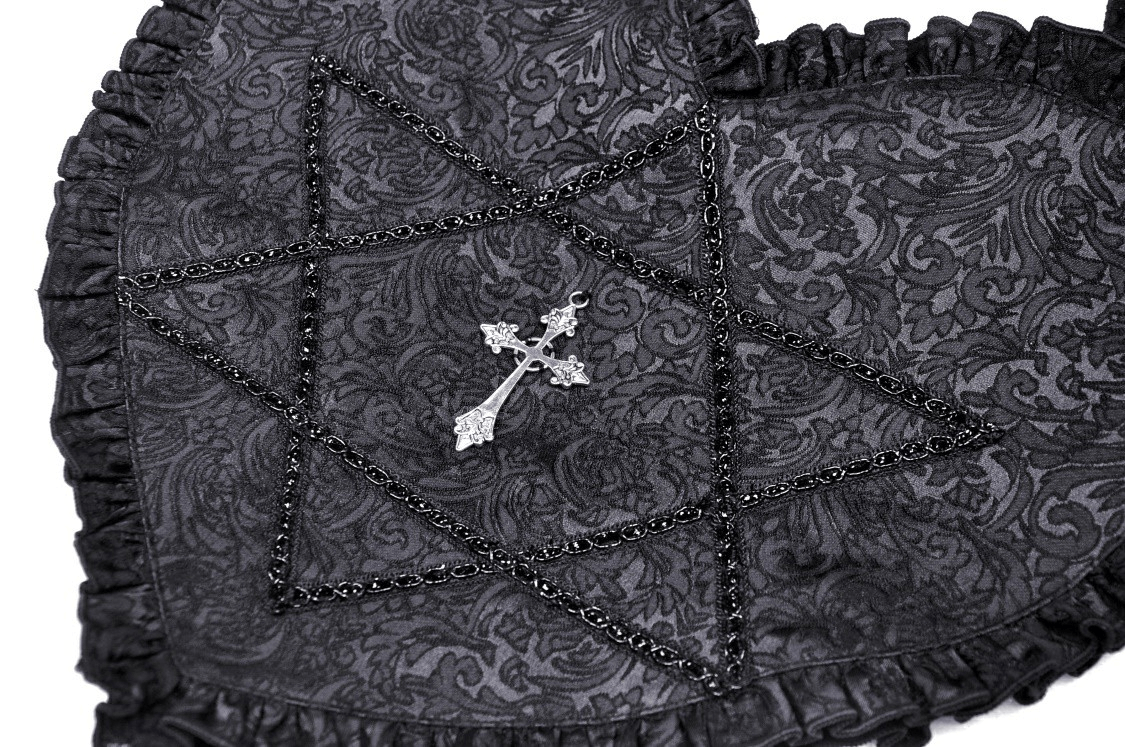 Close-up of Gothic heart shoulder bag with cross detail and ornate black fabric design.