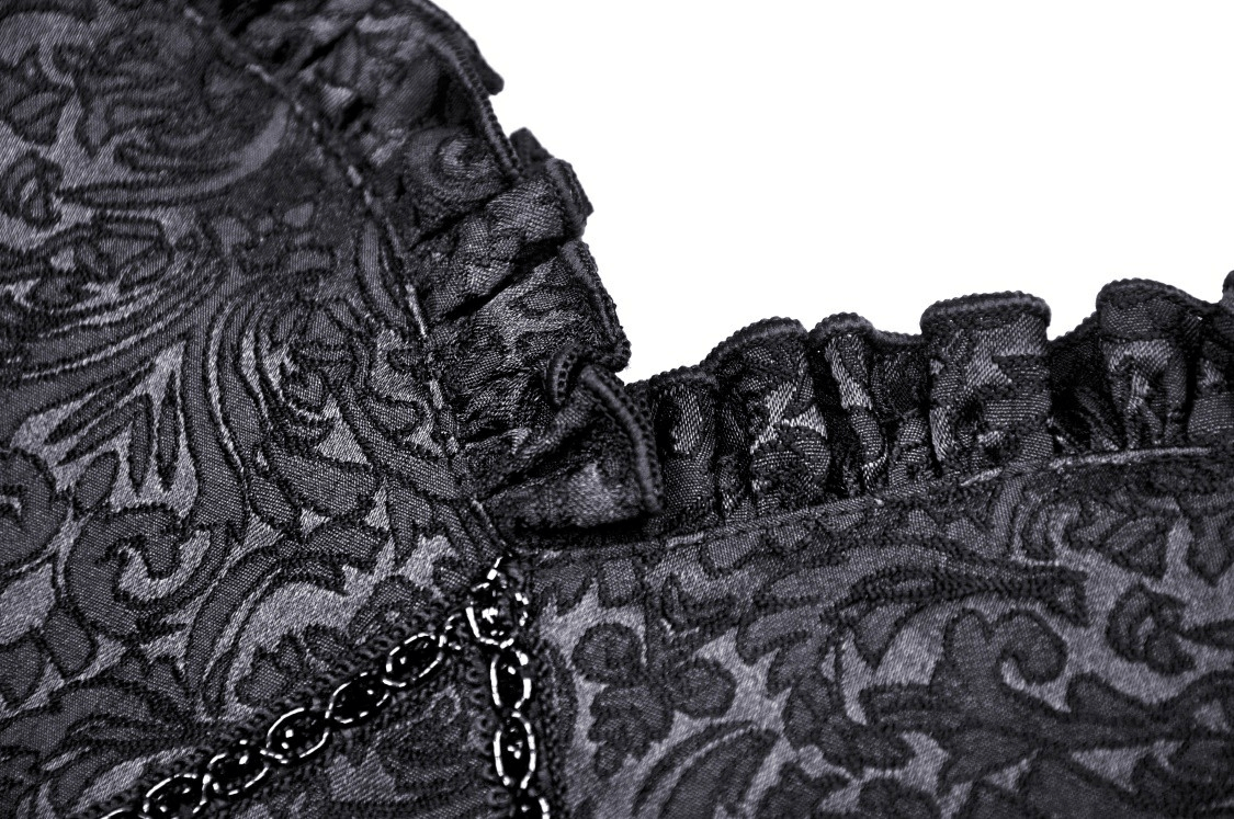 Close-up of luxurious black fabric with intricate patterns and ruffled edges, perfect for gothic fashion lovers.