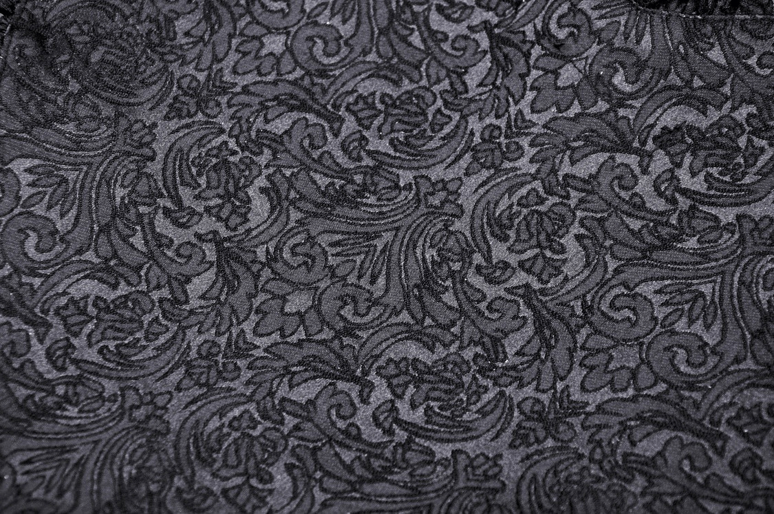 Elegant black floral damask fabric pattern with intricate detailing, perfect for gothic fashion designs.