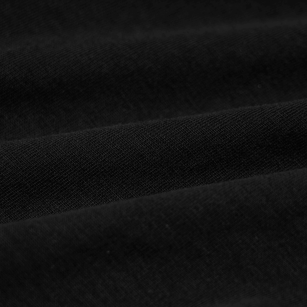 Close-up of soft black elastic knitted fabric for Gothic women's fitted top.