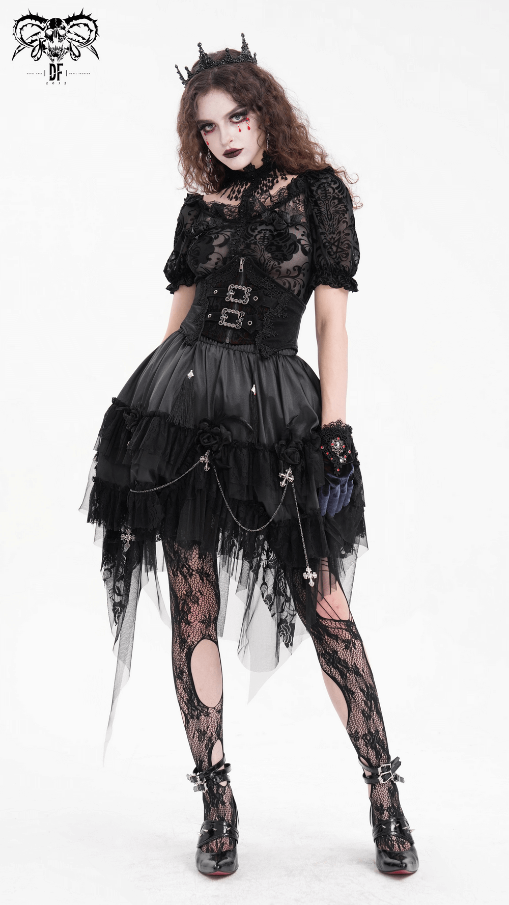 Gothic women's lace corset dress with layered skirt and lace tights, embodying dark romanticism and avant-garde style.