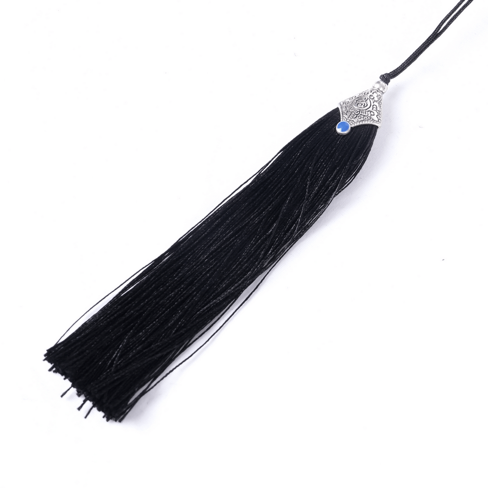 Elegant black tassel with silver detail and blue gemstone, perfect for accessories or gothic fashion.